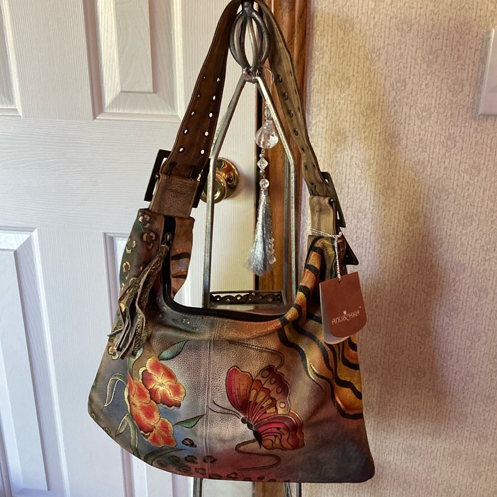 Anuschka, cowhide and hand painted brand new never been used